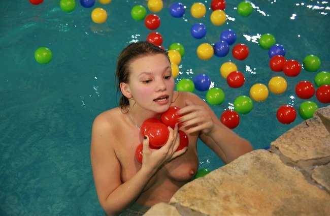 In the water park naked young and adult nudists photo [NudistWorld]