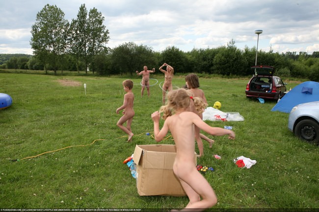 Active naked rest in a nudist camp [NudistWorld]